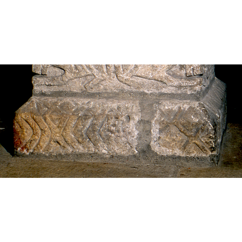 or are they saltire motifs? mostly on the upper chamfer, with some diaper motifs in between the chevron pattern -- notice the [remains of?] paint on the lower left corner