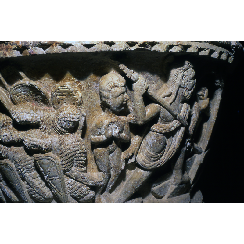 to the left are one of the two sets of sleeping soldiers that belong to the Three Marys at the tomb scene; on the right are the rescued soul and Christ in the Harrowing scene