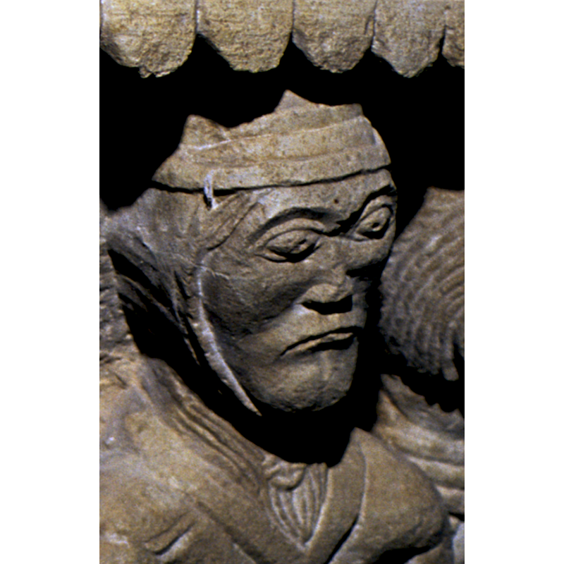 the rightmost figure in the baptism scene; a woman