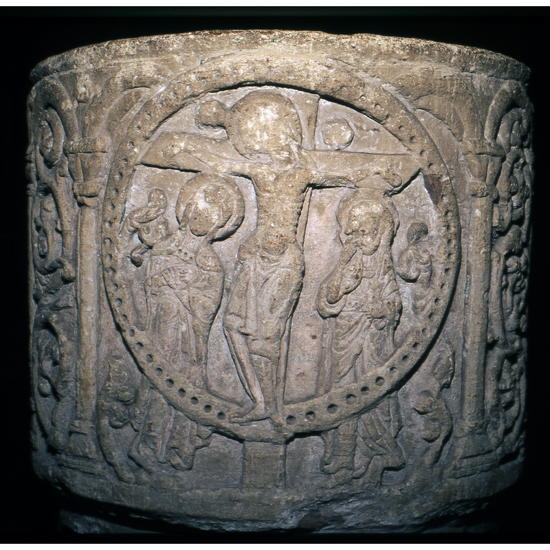 in a beaded-tape circle; East side of the font
