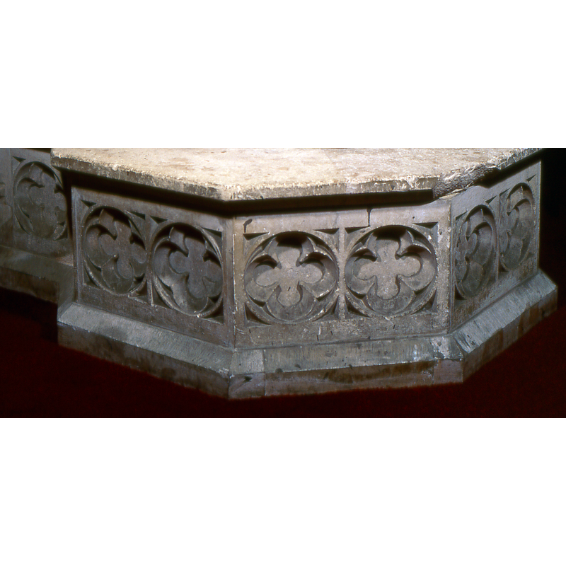 Two on each side of the octagonal plinth