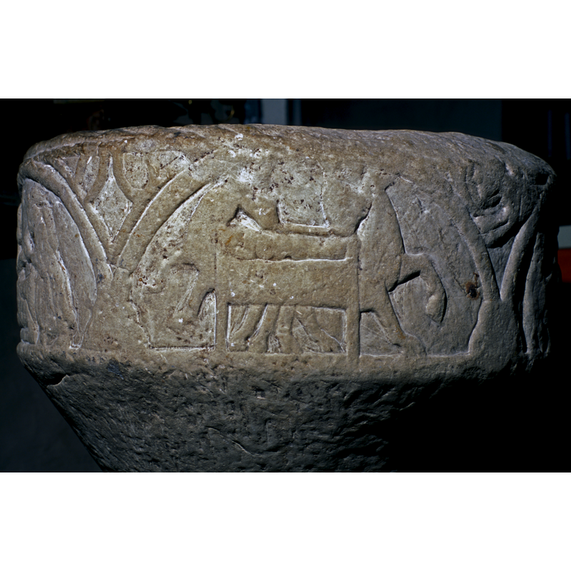 Takes place in two arches. The first shows Mary and Joseph; the second depicts the infant in the manger with the ox and ass, the latter seen here in a sort of melee identified in the SHM [cf. Image 1200714017] as "barnet, åsnan och oxen"