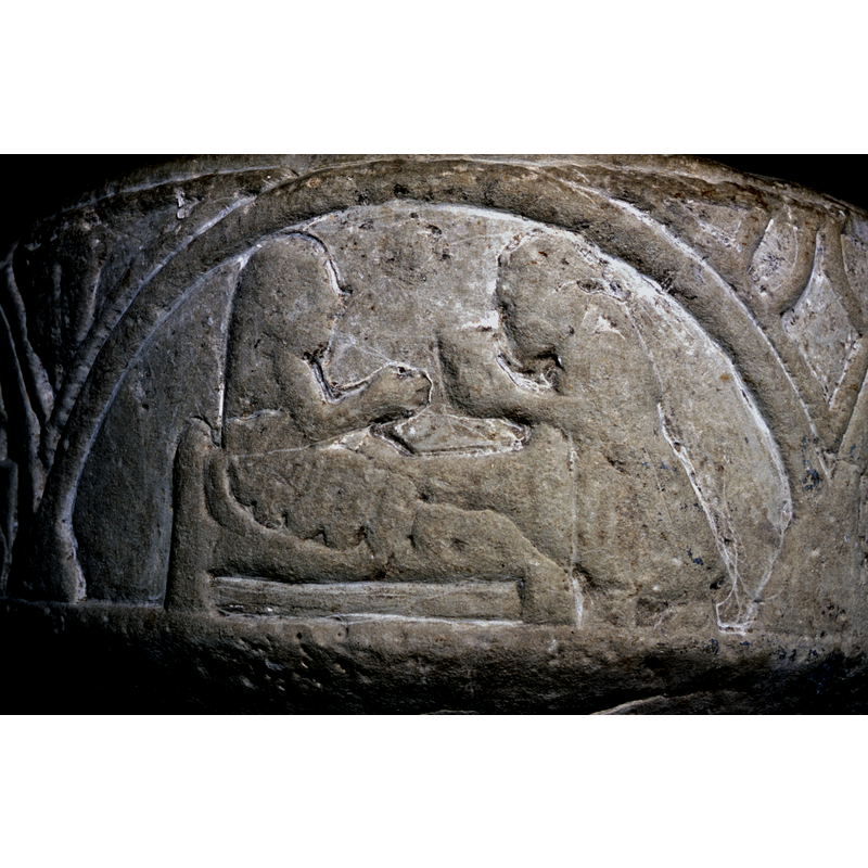 Takes place in two arches. The first shows Mary and Joseph; the second depicts the infant in the manger with the ox and ass.