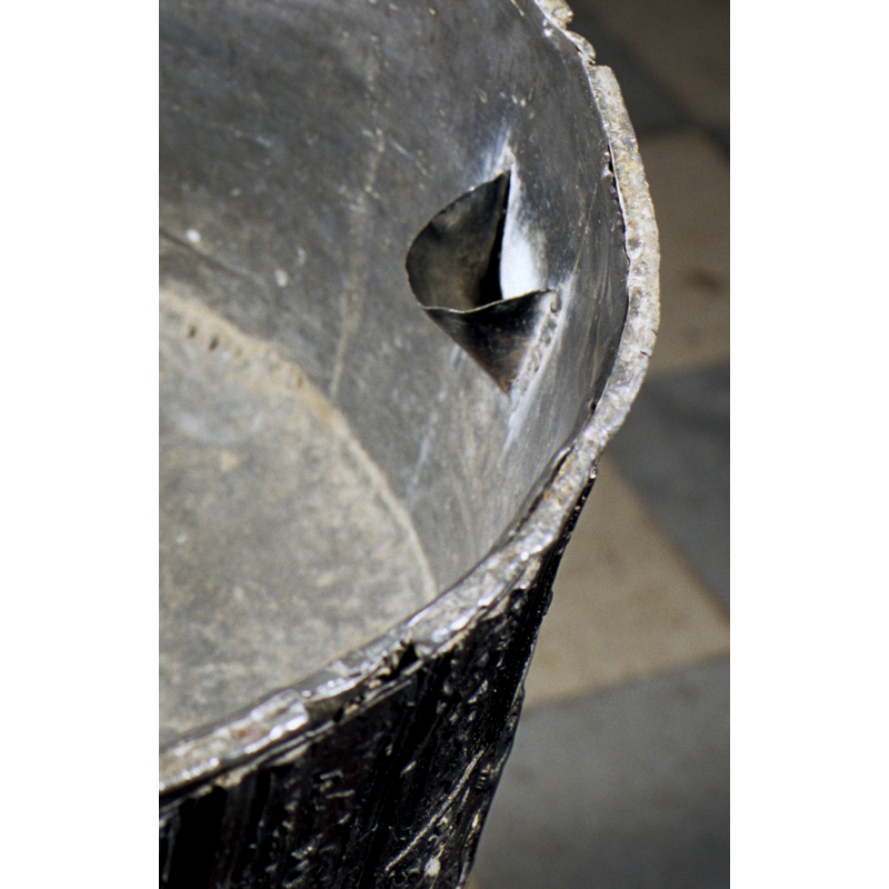 the small pocket welded to the interior side of the basin well -- may not have been part of the original design
