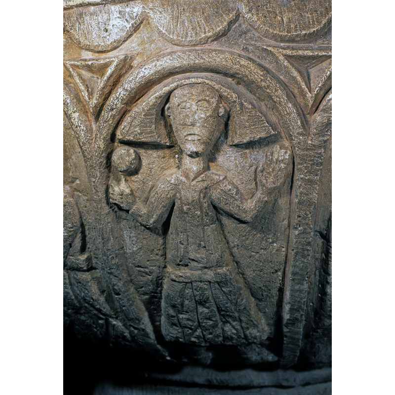 the object above his right hand appears to be a ball; cannot be a juggler in ecclesiastic garb