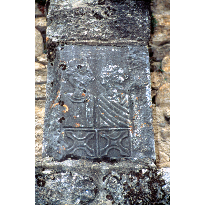 Roman 'cippe' by the south doorway