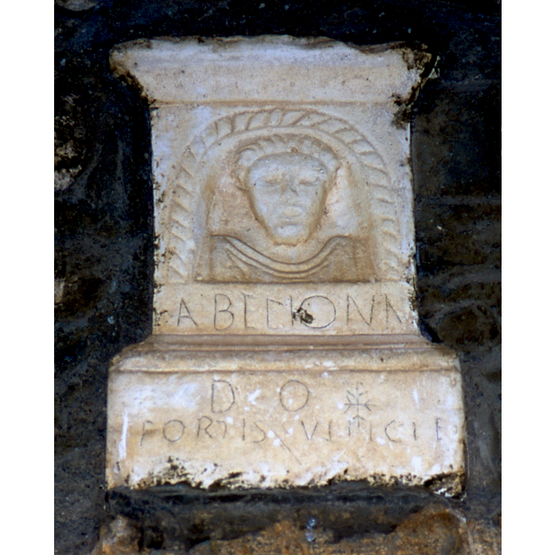 Roman 'cippe' by the south doorway