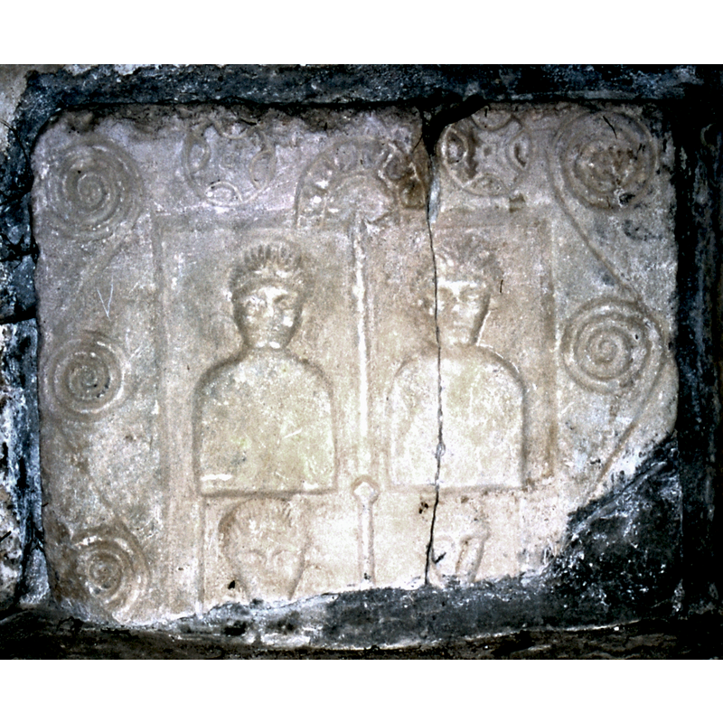 Roman 'cippe' by the south doorway