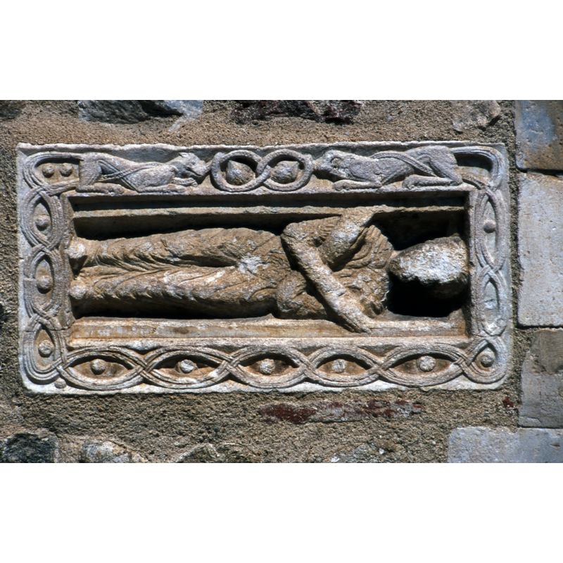 funerary slab built into the west portal