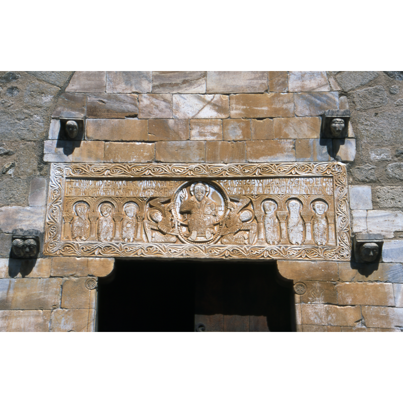 the lintel and the tympanum with the heads framing it
