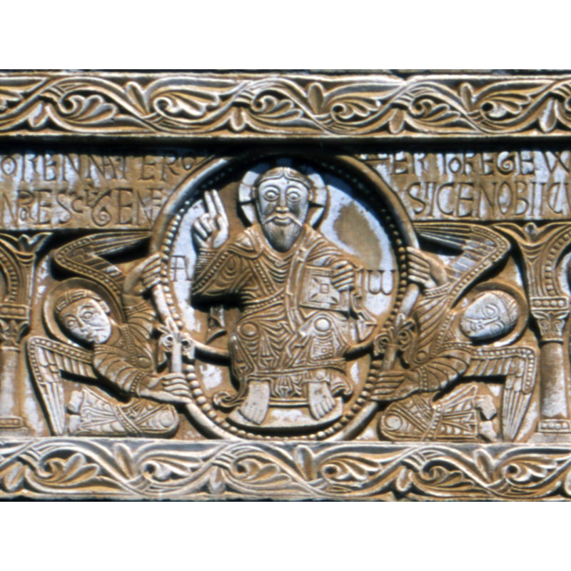 Listed in Mérimée [ref.: PA00104117]: "Selon une inscription, le linteau sculpté du portail daterait de 1019-1020, ce qui en fait le plus ancien monument daté de l'art roman en France. L'abbaye, fondée aux alentours de 819, a été détruite sans doute par les Normands, puis reconstruite en 981 [...]  le linteau ayant été sculpté pour orner le portail, disparu au 12e siècle. Des travaux, comprenant sans doute l'allongement de la nef et, lors du voûtement de l'ensemble, la surélévation des goutterots, ont dû être exécutés au cours du 12e siècle. Vers la fin de ce siècle ou au début du 13e, le linteau aurait été transféré à son emplacement actuel."