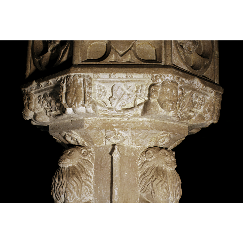 in the panels of the upper level of the underbowl chamfer, with the fruit