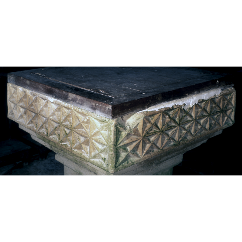 On two of the sides of the basin; the X-shaped motif is more like a nail-head or dog-tooth.