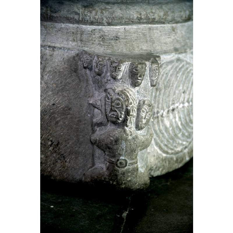 bearded and wearing a belt of strength, identified in Carlsson as Samson; there are five heads above it, one on its shoulder.  NB: this "belted" image may have nothing to do with Samson [cf. Rydén's notes on the belted figures at Lund Cathedral (1995: 48ff)].