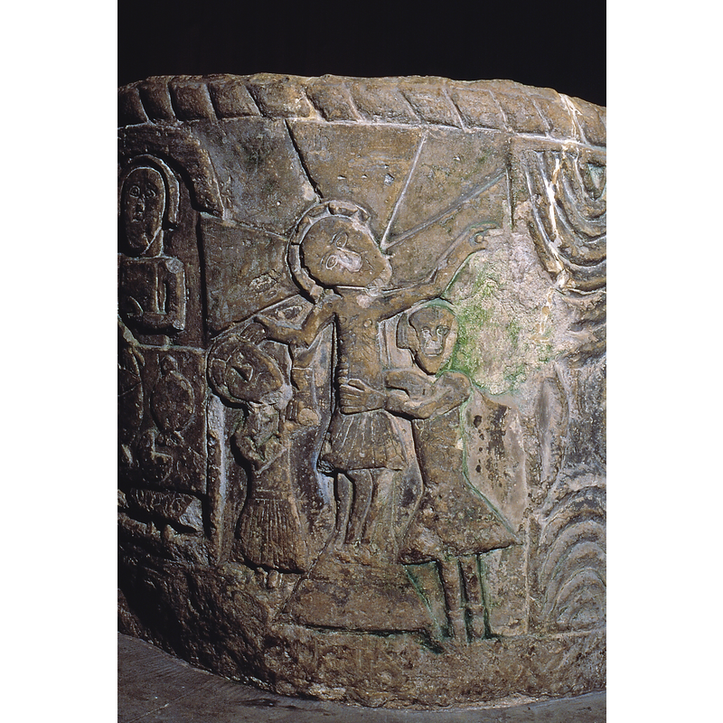 Descent from the Cross. Christ is being taken down from the cross by two figures (the cross has the general shape of a Maltese cross)