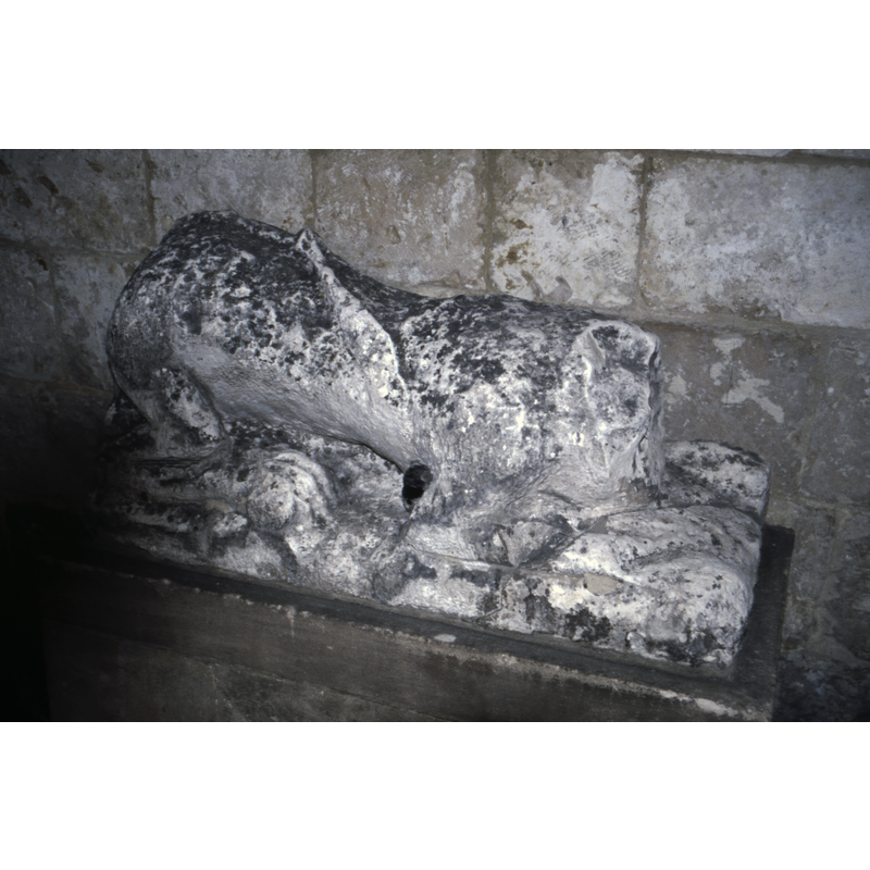 a headless lion couchant, probably 12thC