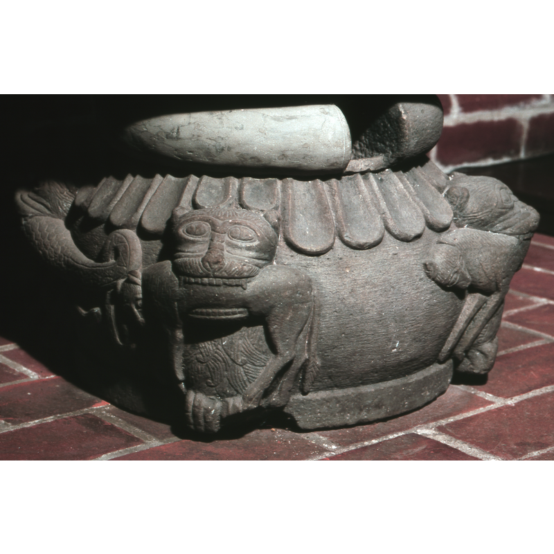 a very broad moulding in which a square hole for side drainage has been cut