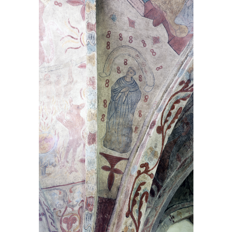 unfortunately the legend on the scroll is gone; could it be Bernard of Clairvaux? is the repeated "8" all around the figure a related symbol?