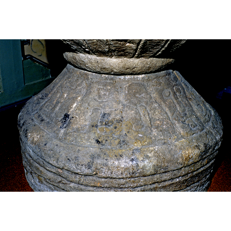 some of the heads on the base siidesl very eroded; others appear to be vegetal