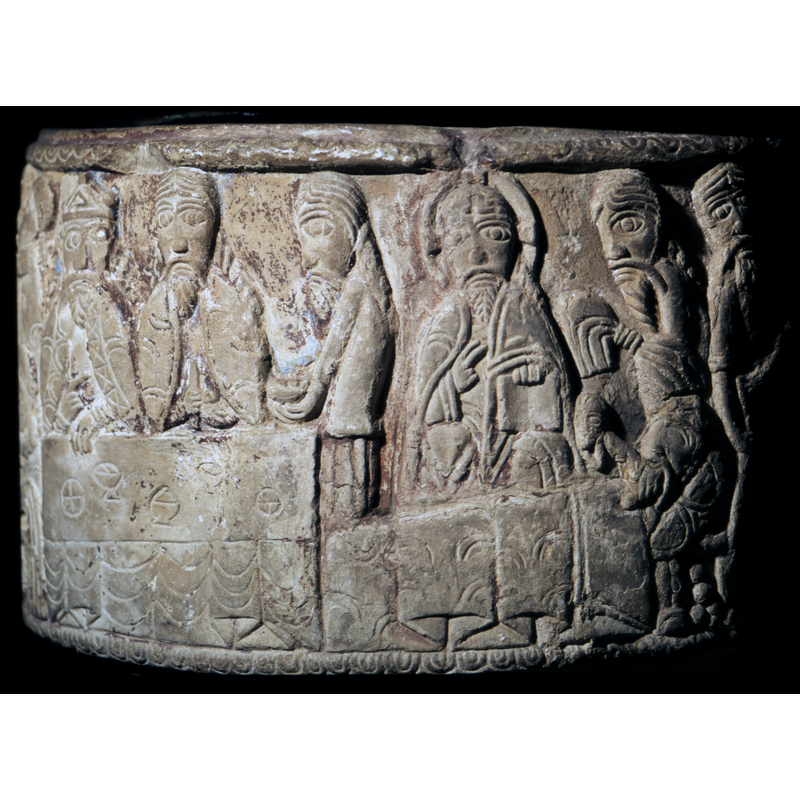 a bed, person lying in it, head to the right and over it in the background, Christ, haloed, crossed, and right hand in benediction and left hand holds open book. The man lying in the bed, covered to the neck - his soul is being taken up - a small figure comes from his mouth. Above him, two figures, the one on the right is digging with a spade. Christ is present.