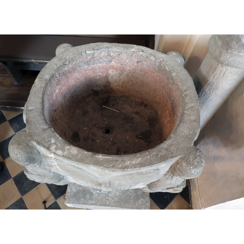 showing the unlined interior and the centre drain hole