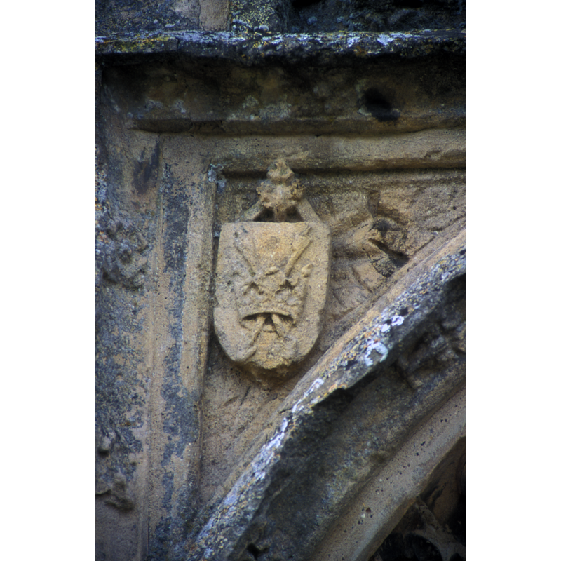 coat of arms in left spandrel: two arrows pointing down inside a royal crown; according to James (1930: 114), "Arms, attributed to St. Edmund, King and Martyr"