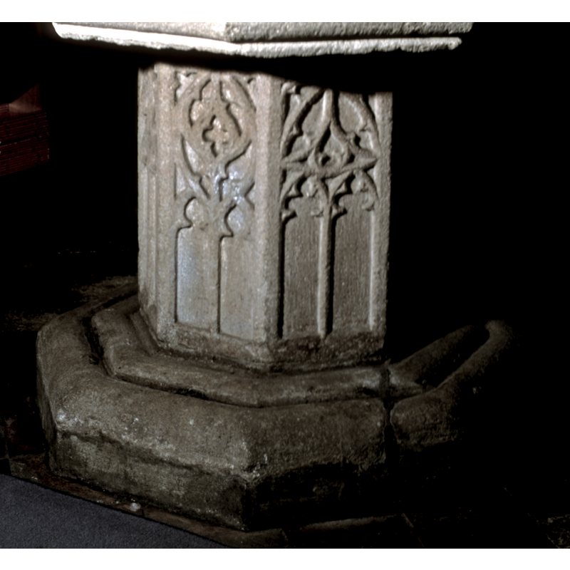 the upper surface of the octagonal lower base has two broad mouldings separated by a deep groove