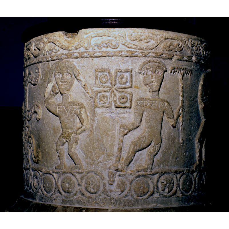 on the east side of the font; Adam is actively engaged in agricultural toiling; not clear what Eve is at, other than demurely holding the fig leaf over her pudenda