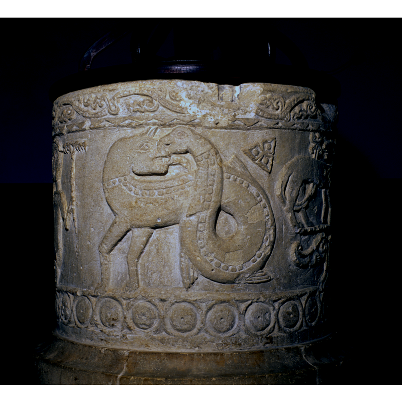 to the right of Adam, therefore the north side of the basin, approximately -- Drue (1914) identifies it as an amphisbaena [cf. Font notes], even though there are no wings on the dragon part of the body -- notice the large damage at the upper rim, no doubt related to one of the metal staples of an old cover