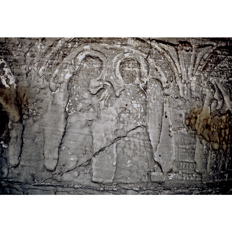 Annunciation. Gabriel stands to the right in profile, appears to be holding mary's right hand inhis right hand, haloed. Mary in profile, facing Gabriel.