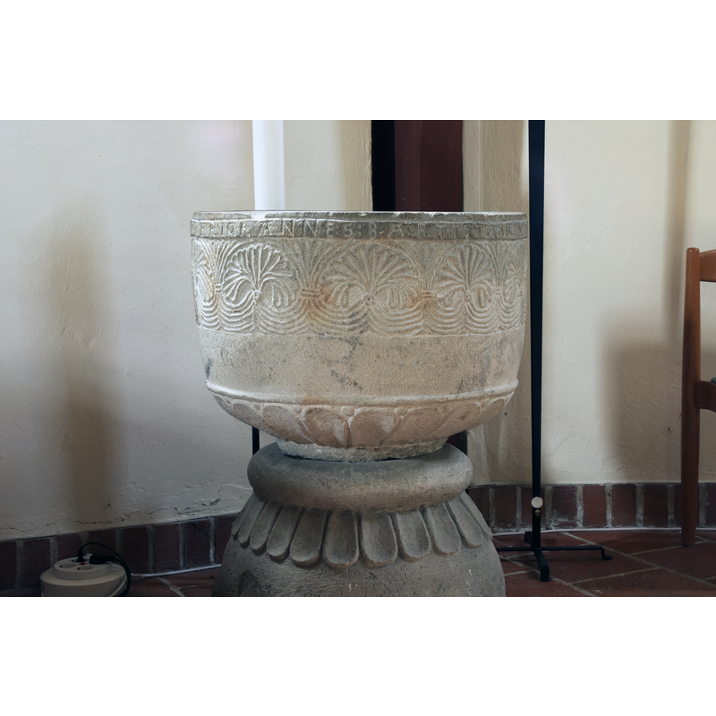 showing part of the inscription below the upper rim