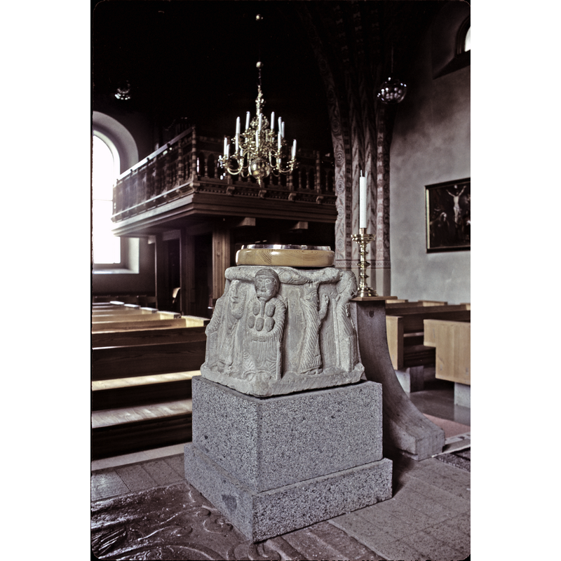 the re-designed font using the old base in the context of the church interior