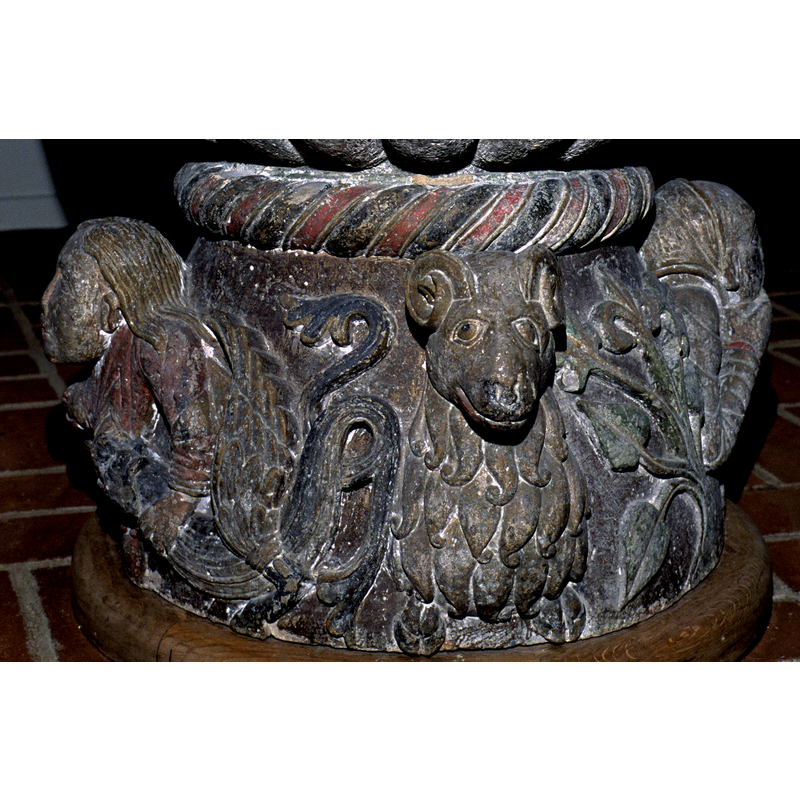 though the head is that of a ram, the mane resembles that of a lion's