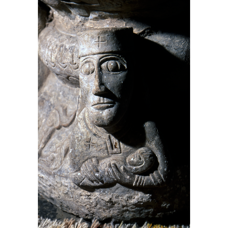 incised Greek crosses in the headgear and clothes