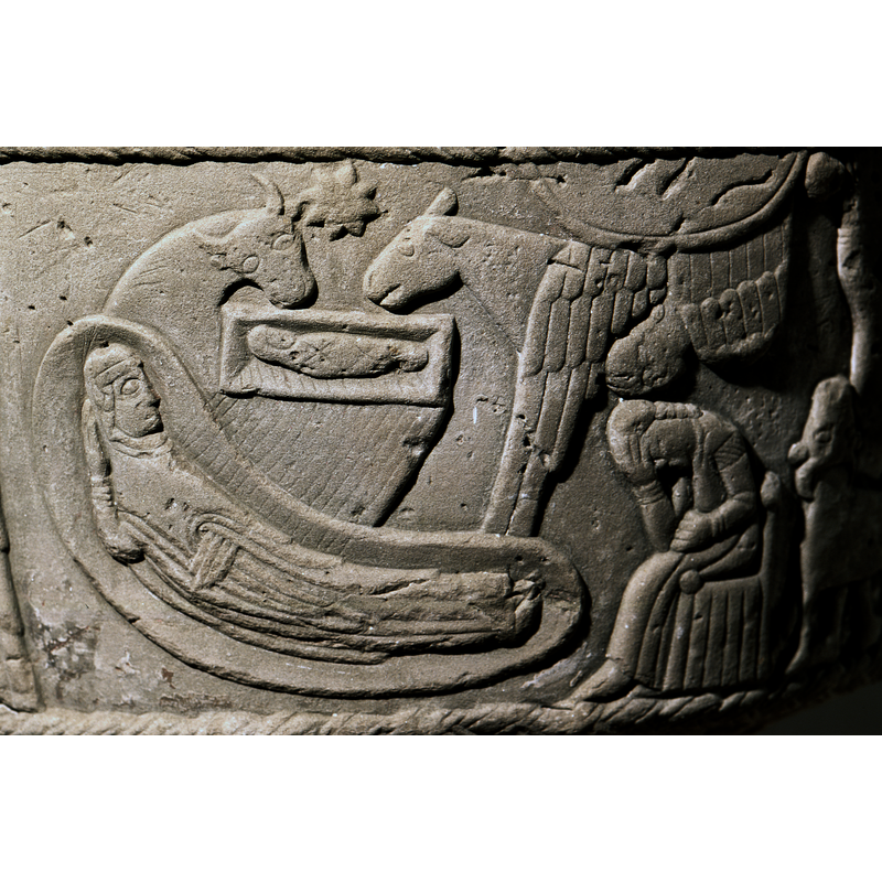 Nativity:banana-shaped bed, curved with Mary, whose left hand rests on her abdomen, the right hand supporting her head; above the bed is a rectangular cradle with baby Jesus all swaddled up; the child's head is to the left; ox and donkey above, eight-pointed star of Bethlehem beween them; rays project diagonally from the cradle onto Mary's bed; in the upper right-hand corner angel dives from a cloud down with open wings, one of which touches Mary's bed; Joseph dreams in his Gotland chair in the bottom right corner; none of the figures are haloed.