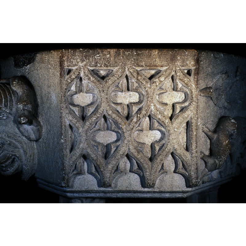several quatrefoils with three Ogee arches on bottom; on the west side of the basin
