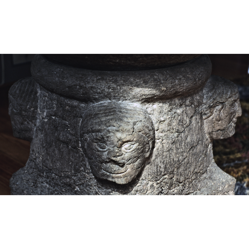 a smiling face on the southeast corner of the base