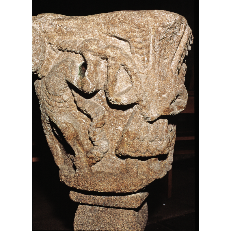 one end of the rope is held by the angel in both hands, and by the left hand of the man on the left; it themn wraps around the latter's neck, with the other end of the rope coming down by his back and side