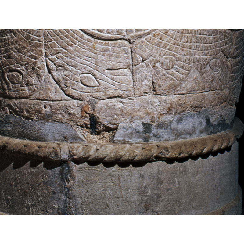 around the lower side of the basin -- notice the metal peg, damage, repairs, etc.