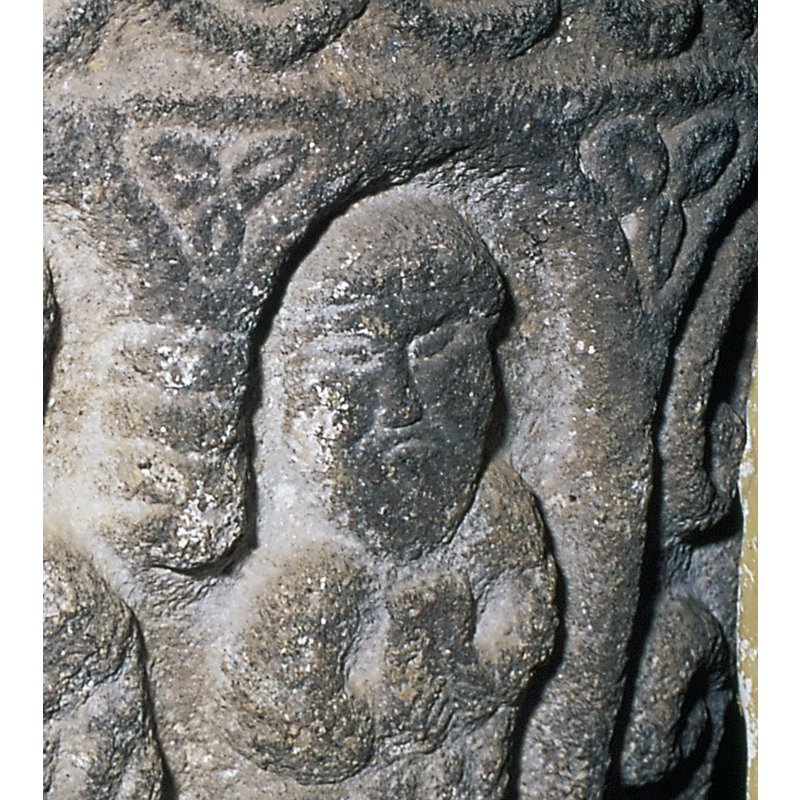 one on each spandrel of the arch that is occupied by the orant figure in the baptismal scene