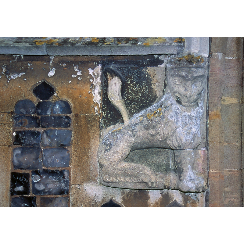 a sejant-gardant lion on the left [east] side of the north porch; there is another similar on the right [west] side