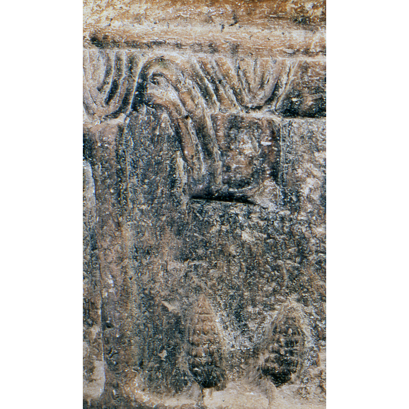 only part of it remains: head in profile looking left, arms raised