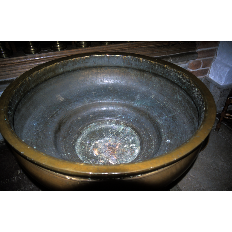 the metal insert used inside the stone font