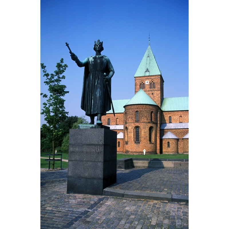 statue of King Valdemar and east view of the church