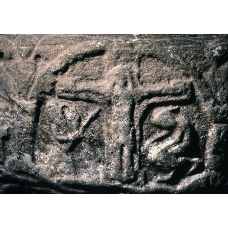 Crucifixion. Christ full frontal, parallel. To the left, under the arm, soldier with a lance, and to the right side, under the arm, a figure croaching, head bent down.