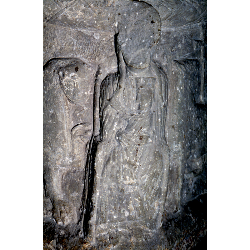 Madonna and Child enthroned in Gotland chair. She holds the baby in her mantle (?) recheck - baby crowned and holds the Virgin's braidl the child body is in profile but in a gardant pose, looking out to the viewer