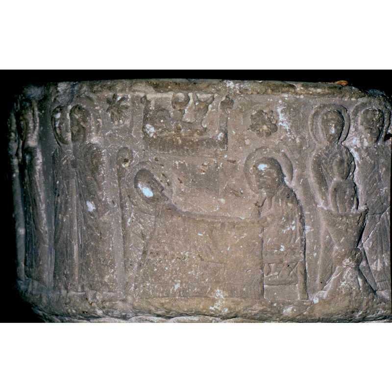 Nativity. Across the front of the composition, bed with headboard, bed covers, figures haloed and lying (Virgin). The right hand of Virgin's hand reaches toward Joseph - and their hands link. Joseph sits on a Gotland chair, in profile, haloed, bearded. Head rests on his right hand. Above  the Virgin, a cradle or manger which looks like a viking ship, the baby's head to the left and above the ox and ass(right). A star is present. The cradle projects rays but don't reach the bed - like Majestatis works???check!