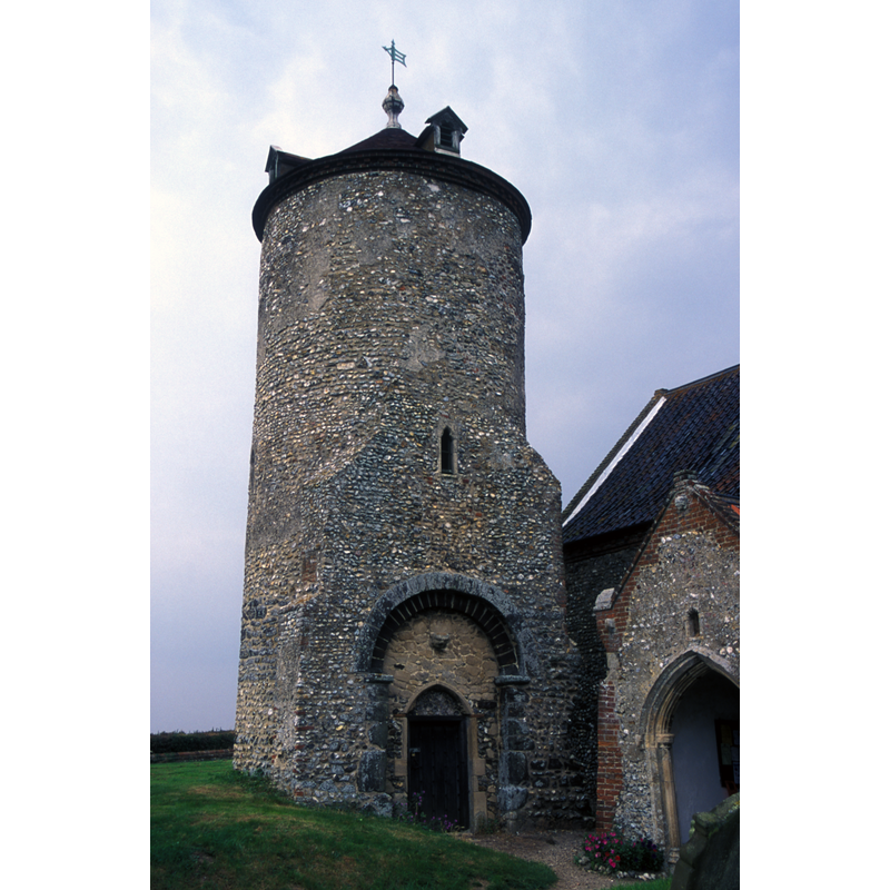 the body of the older church has disappeared, but the contour is still visible on this east side of the tower