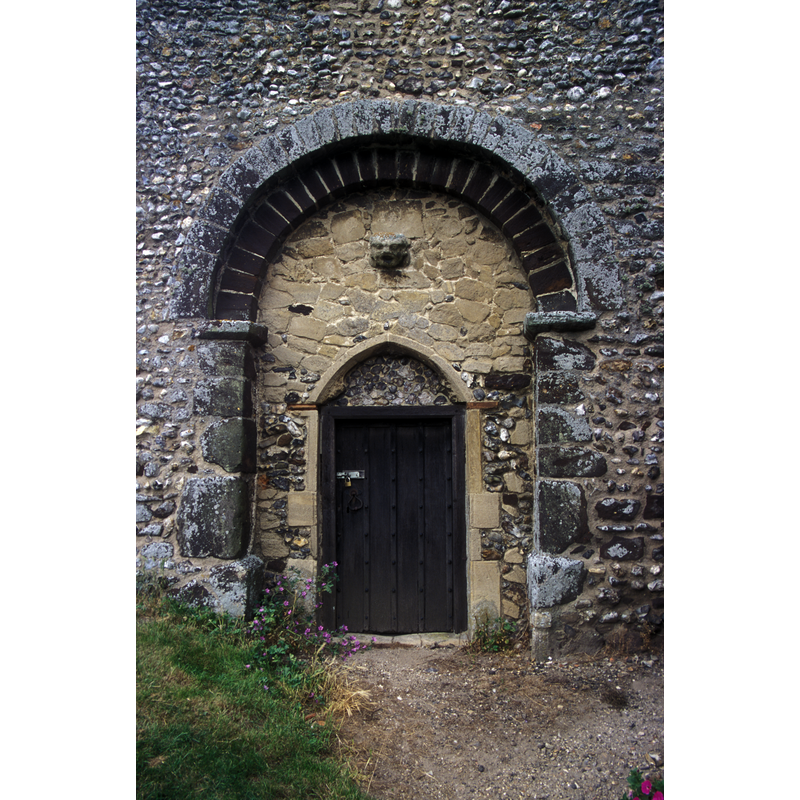 this present entranceway to the tower is likely the interior tower arch of the original church