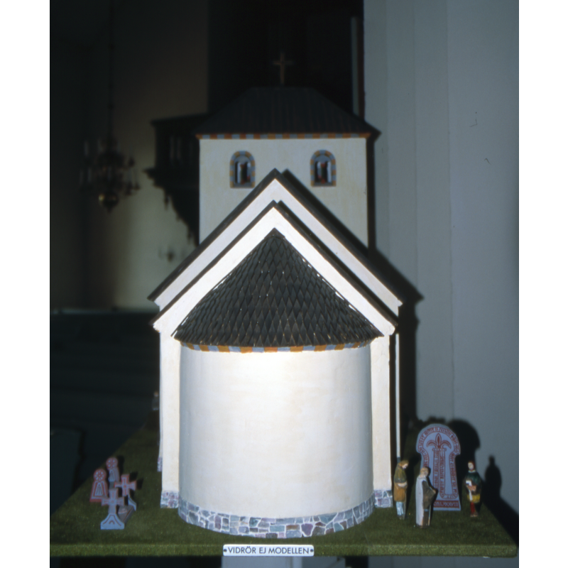 a modern maquette of the old church as it was in the 13thC